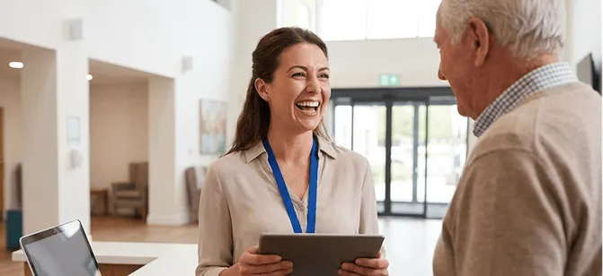 Care professional discussing with client